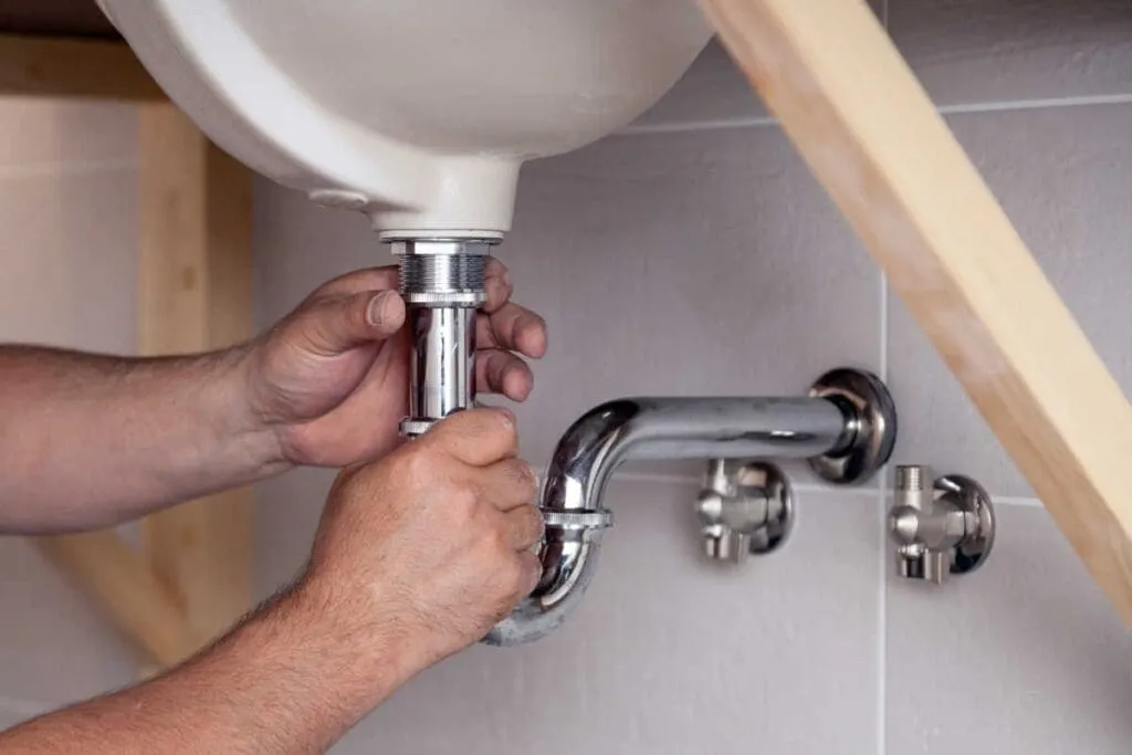 Plumber completing a plumbing installation in San Angelo & Abilene, TX